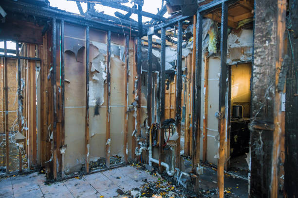 Professional Fire Damage Repair technician working in Cochituate, MA